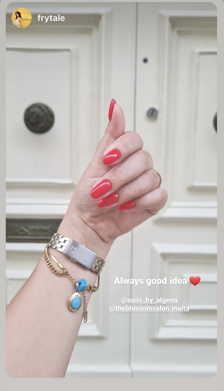 Instagram story showing a glossy red manicure by Nails by Algena