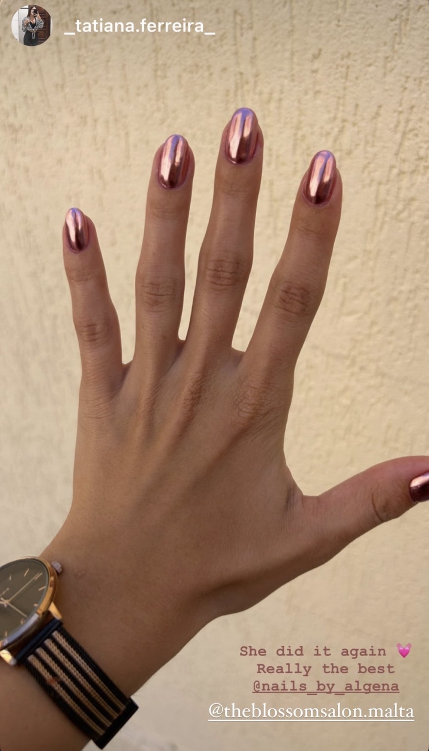 Instagram story showing a rose chrome manicure by Nails by Algena